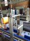 Automatic labeling machine for flat cylindrical bottles and jars Maqmundi