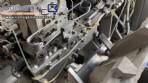 Tetra Pak A3 aseptic filling machine with cardboard packer 70 and tray shrink 51.