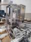 Line for filling powdered products in rigid bottles Optima