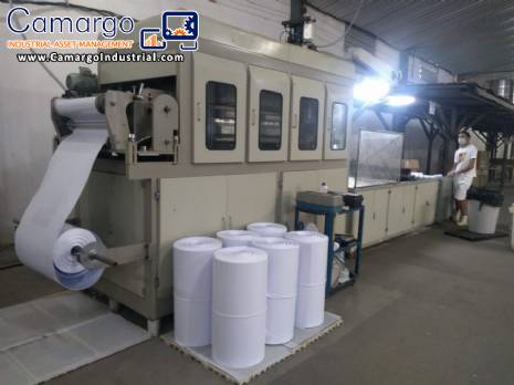 Automatic machine for manufacturing plastic cups