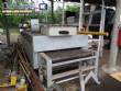 Conveyor oven with direct flame