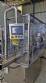 Complete filling line with Tecman Nelpas Tecnoenvase Tudela bottle filling, labeling, capping, and positioning machines for cosmetic liquids.