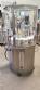 Complete filling line with Tecman Nelpas Tecnoenvase Tudela bottle filling, labeling, capping, and positioning machines for cosmetic liquids.
