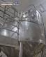 Stainless steel surge tank with agitator, 2000 liters.