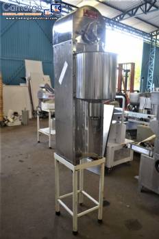 Vertical dispenser for liquids and pastes