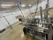 Automatic stainless steel filling machine for a�a� jars, Bramak ice cream