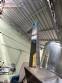 Packaging line with IMSB bung capper, Maqmundi labeler and accumulator table