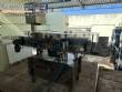 Packaging line with IMSB bung capper, Maqmundi labeler and accumulator table