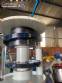 Gravimetric rotary filling machine in stainless steel with cabin