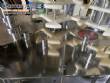 Gravimetric rotary filling machine in stainless steel with cabin
