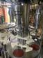 Gravimetric rotary filling machine in stainless steel with cabin