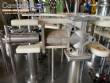 Gravimetric rotary filling machine in stainless steel with cabin
