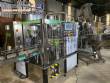 Gravimetric rotary filling machine in stainless steel with cabin