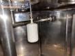 Gravimetric rotary filling machine in stainless steel with cabin