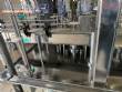 Gravimetric rotary filling machine in stainless steel with cabin