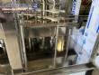 Gravimetric rotary filling machine in stainless steel with cabin
