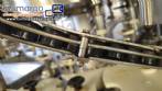 Monobloc rotary filling machine with 12 nozzles and screw capping machine