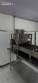 Automatic stainless steel deep fryer for donuts and cream puffs.