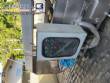 Filling line for 10 and 20 liter gallon jugs with filling machine and rinser/washer.