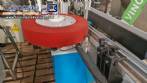 Automatic double-head labeling machine for cylindrical and flat bottles, Tudela, 3,000 labels per hour.