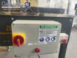 Adhesive tape case sealer with safety enclosure and door sensors Strapack