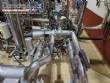 Stainless steel processing reactor tanks, 1140 liters, with pump valves.