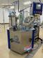 Rotary filling machine with Bramak aa jar capping sealer