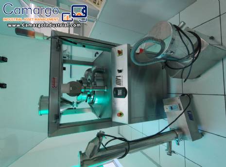 Neuberger rotary tablet press, 20 punches, 900 tablets per minute.