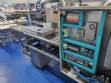 Indata automatic thermoforming, packaging, and sealing machine for blister packaging.