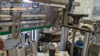 Automatic stainless steel labeling machine with two heads for Narita self-adhesive labels