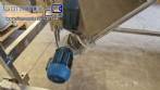 Inclined screw conveyor with stainless steel silo