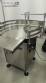 Rotary filling line for dropper bottles with Certo cylindrical self-adhesive labels