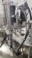 Rotary filling line for dropper bottles with Certo cylindrical self-adhesive labels