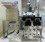 Capsule encapsulator, counter and polisher, capacity 22,000 capsules per hour.