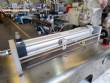 Countertop stainless steel filling machine for liquids and viscous liquids