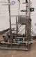 Rotary filling, rinsing, and capping machine for carbonated products 40 60 8 CFT