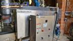 Labeling machine with steam sleeve tunnel and bottle baler
