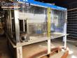 Zegla rotary filling machine with rinser and three-block capping system.