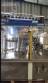 Zegla rotary filling machine with rinser and three-block capping system.