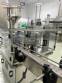 Volumetric dosing filling machine with sealer and capper in stainless steel Delgo 2000 pots per hour