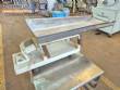 Vibrating trough for multi-head scale