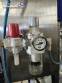 Stainless steel filling machine for beer liquids in Brabeer bottles