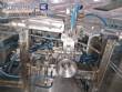 Stainless steel filling machine for beer liquids in Brabeer bottles
