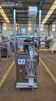 Dosing and packaging machine for granular and powdered products Dosing and packaging machine for granular and powdered products